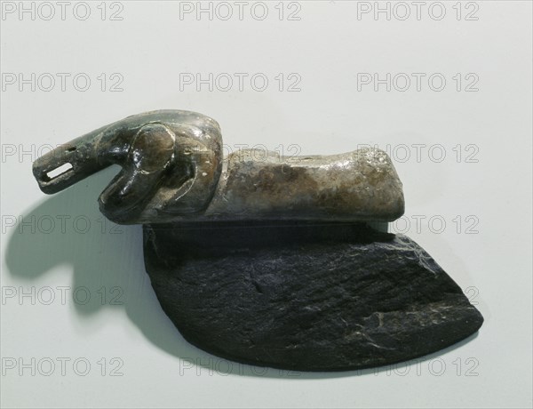 The Norton Eskimos introduced many of the tools that came to be so characteristic of historical Eskimos, including this slate womans knife or ulu which was used with a rocking rather than thrusting motion