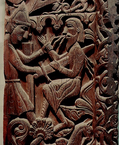 Detail of a carving from a stave church portal illustrating the story of Sigurd