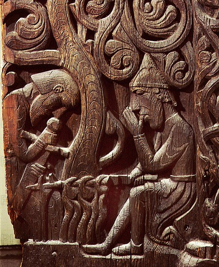 Stave church carving with a scene from the story of Sigurd