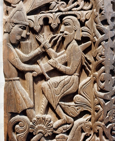 Detail of a carving from a stave church portal illustrating the story of Sigurd