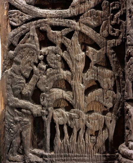 Stave church carving with a scene from the story of Sigurd