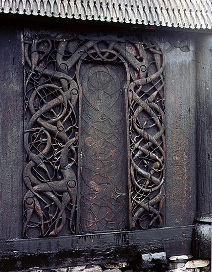 Carving on the side of the stave church at Urnes
