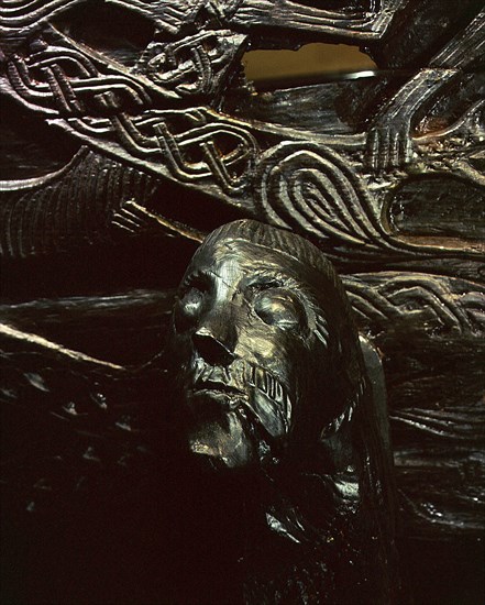 Carved figurehead from the cart found in the Oseberg ship burial