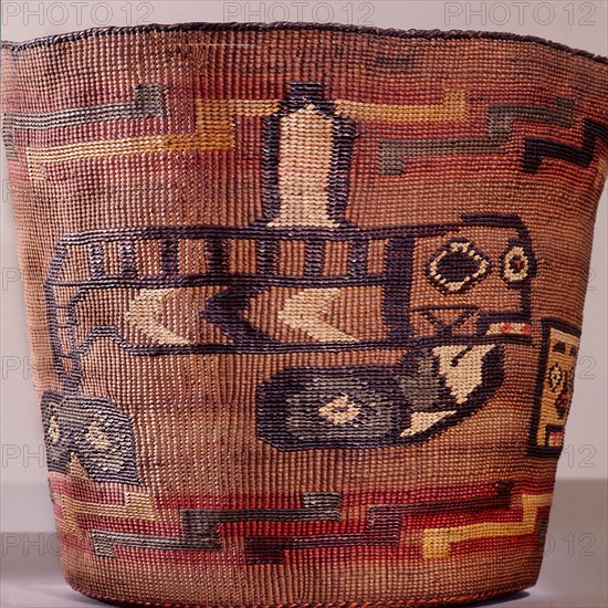 Basket woven with a killer whale crest