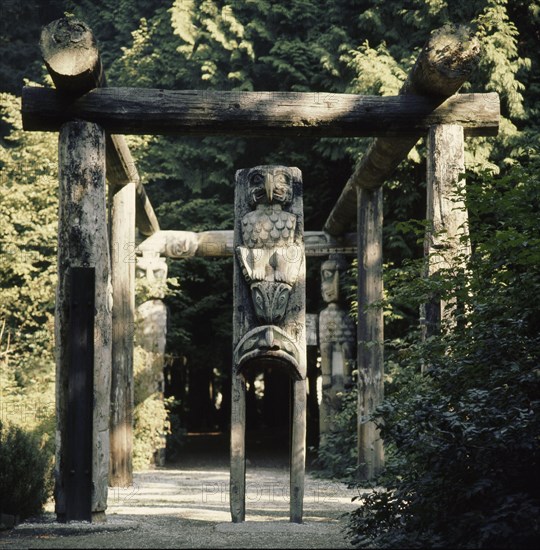 House posts carved with totemic animals