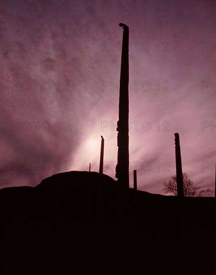 Totem poles at a Tsimshian village