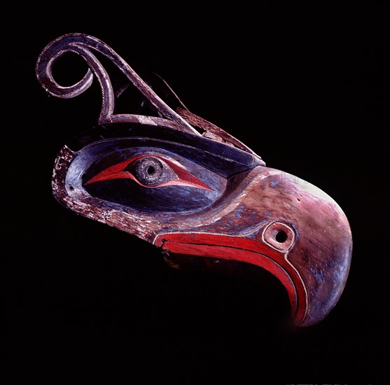 Thunderbird headdress identified by its down turned beak and feathered horns