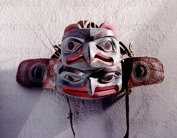 Mask with a depiction of a hawk at the bottom and an eagle at the top