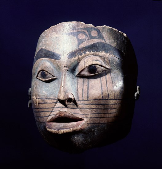 Mask representing the face of an old womans spirit