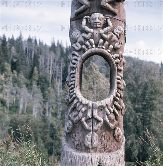 The Hole in the Sky pole which was originally used as a ceremon  ial entrance to the house of Haid zemerhs in Kitwancool