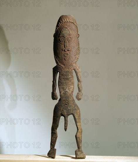 Two dimensional male figure incised on bark, from the Papuan Gulf area