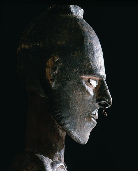 Carved female figure from the middle Sepik area, probably a depiction of a female clan ancestress from a mens meeting house