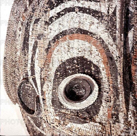 These large circular basketry masks represent female clan specific spirits and are hung inside the village mens meeting house to protect clan members