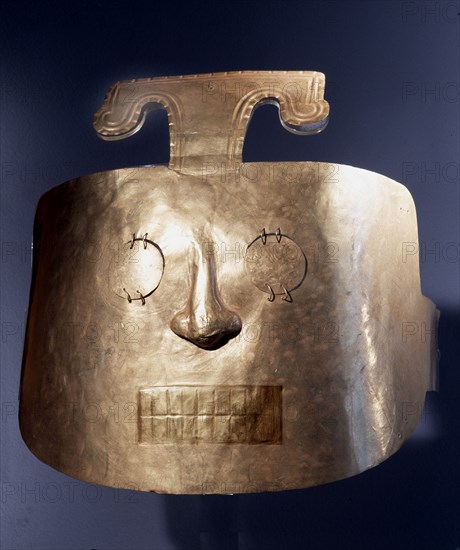 Gold burial mask from a Nazca mummy bundle