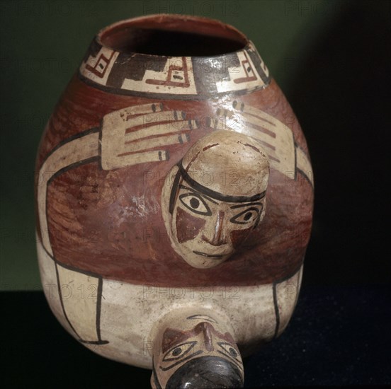 Polychrome Nazca effigy jar showing a couple in the act of sexual intercourse