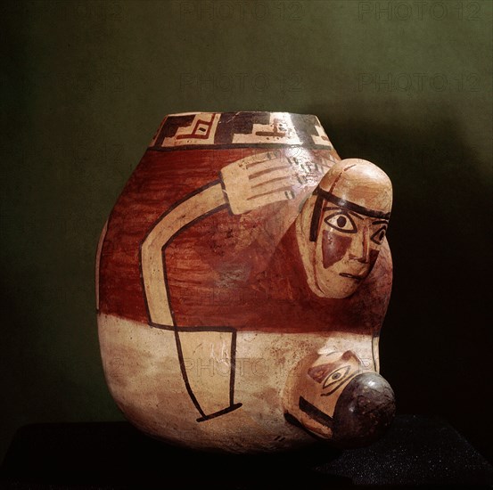 Polychrome Nazca effigy jar showing a couple in the act of sexual intercourse