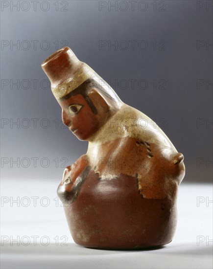 Polychrome Nazca effigy jar showing a couple in the act of sexual intercourse