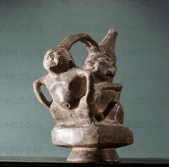 Stirrup spouted vessel depicting copulating couple