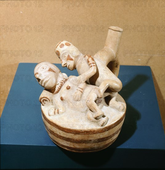 Stirrup spouted vessel depicting a copulating couple