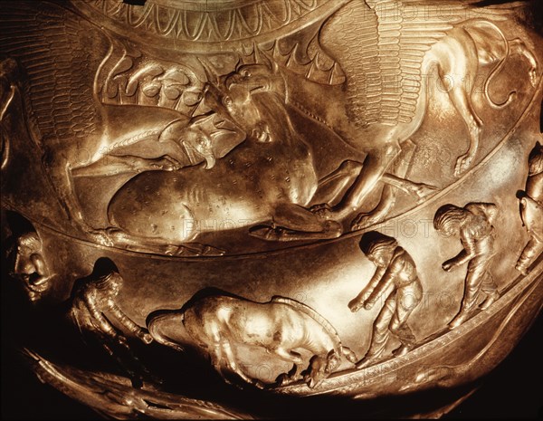 A detail of an amphora frieze showing a group of Scyths breaking horses