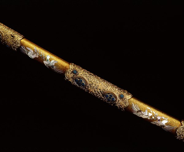 Detail of the scabbard of the court sword Kazadachi, made in deliberate imitation of a sword of the Heian era, with elaborate enamel and gilt work