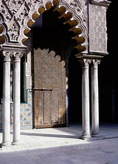 One of a series of elaborately carved double doors in the Court of the Maidens at the Alcazar, Seville