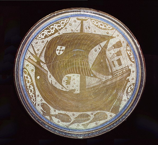 A porcelain lustreware bowl made by Mudejar potters of Manises, Valencia for Christians