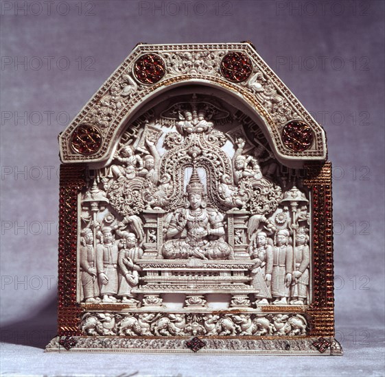 One side of a casket decorated with rubies and gold