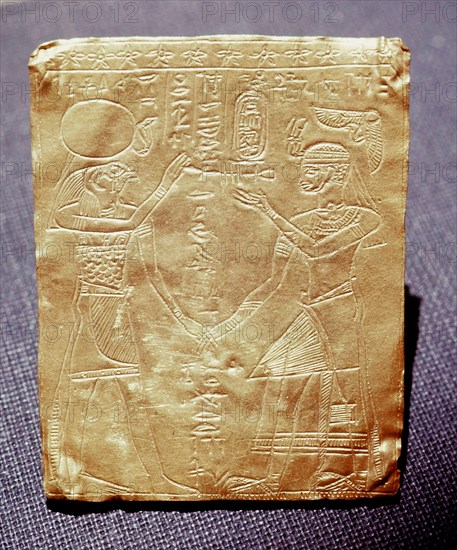 Incised gold plaque depicting a Meroitic king honouring the Egyptian god Horus