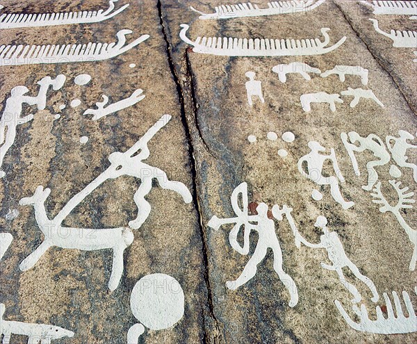 Petroglyphs with human figures,apparently hunting