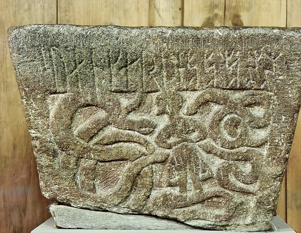 Relief from the side of a baptismal font