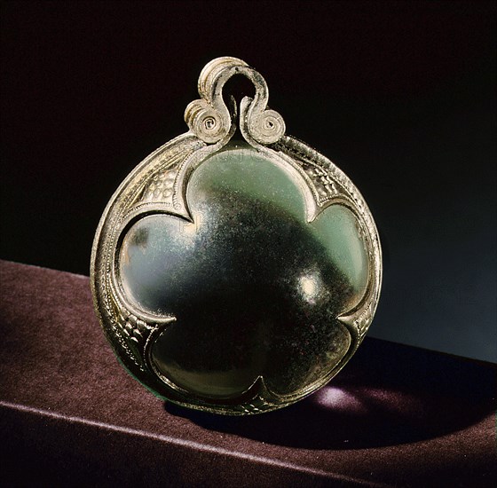 Silver mounted rock crystal sphere, a pendant from a necklace