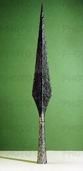 Bronze spear with a decorated silver hilt