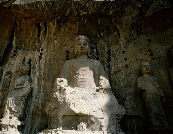 The colossal 17 metre high image of Vairocana Buddha in the Fengxian temple at the Longmen cave temples