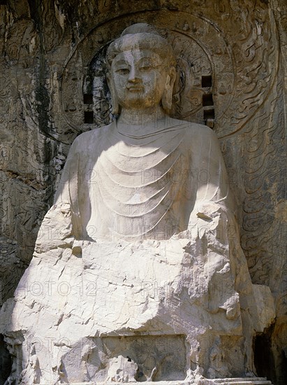 The colossal 17 metre high image of Vairocana Buddha in the Fengxian temple at the Longmen cave temples