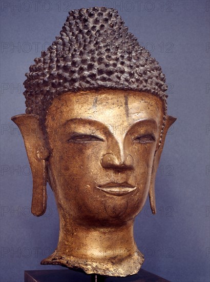 A head of a Buddha in the style of the Lan Na School