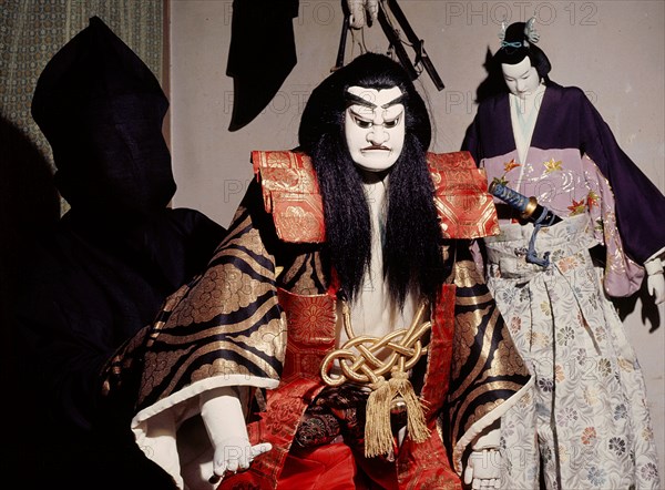 Bunraku puppet and hooded puppet master