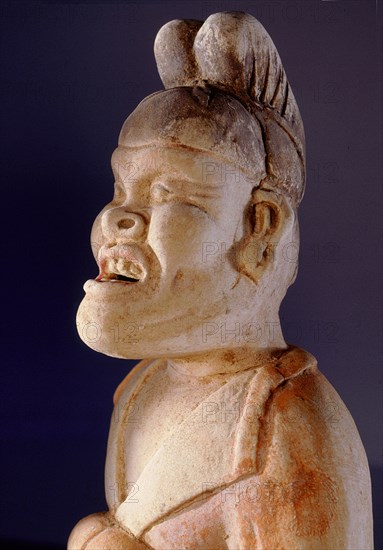 Tomb figure of foreign groom with caricature like face