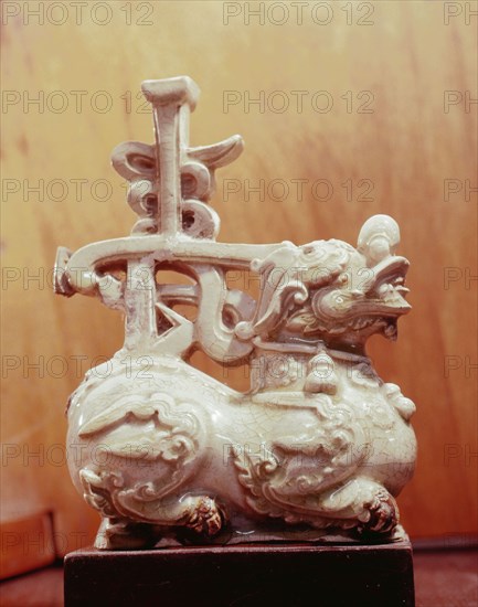 An incense burner in the shape of a lion