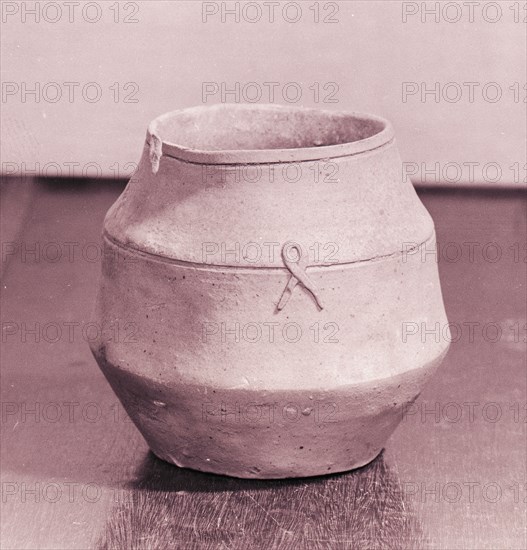 Urn shaped pot lightly glazed