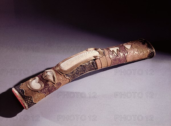 Sword hilt partly covered with same