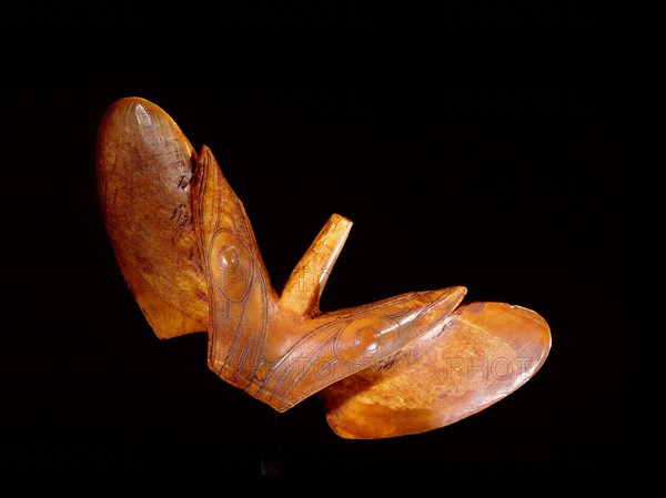 Winged object (bird shape) thought to have served as stabilizers on spear shafts