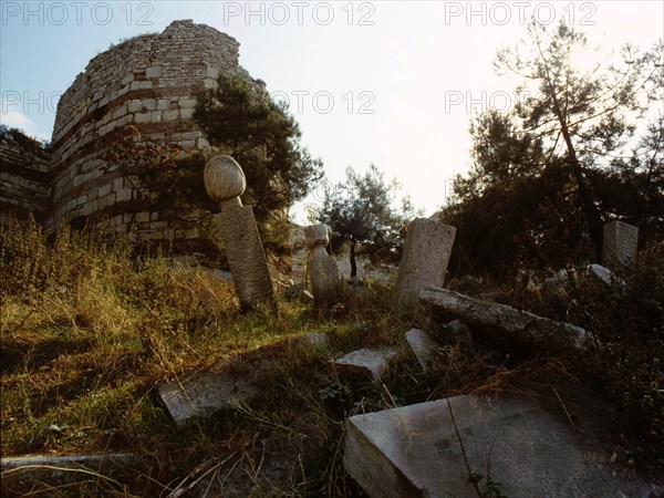 The view of the walls of Constantinople with the remains of a Turkish cemetery outside, contains in microcosm, the history of the two major epoch's of the city's life - the years as capital of a major empire and its later life as the centre of a great Islamic power