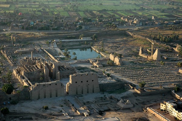Aerial view of Karnak showing the 1st Pylon and the Great Hypostyle Hall in the foreground, the sacred lake in the background and the 8th and 9th Pylons to the right