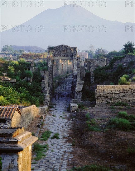 Tombs beyond the walls of Pompeii, with Vesuvius in the background