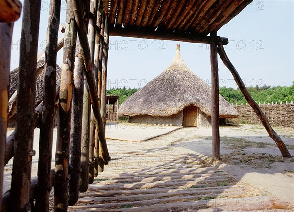 Replica crannog by the lake at Graggaunowen