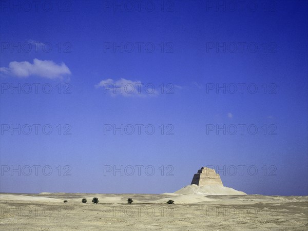 The inner core of the pyramid of Meidum, surrounded by the debris of its collapsed outer covering