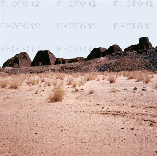 The pyramids of the Meroitic kings and queens in the north cemetery, Meroe, on a ridge overlooking the ruins of the city