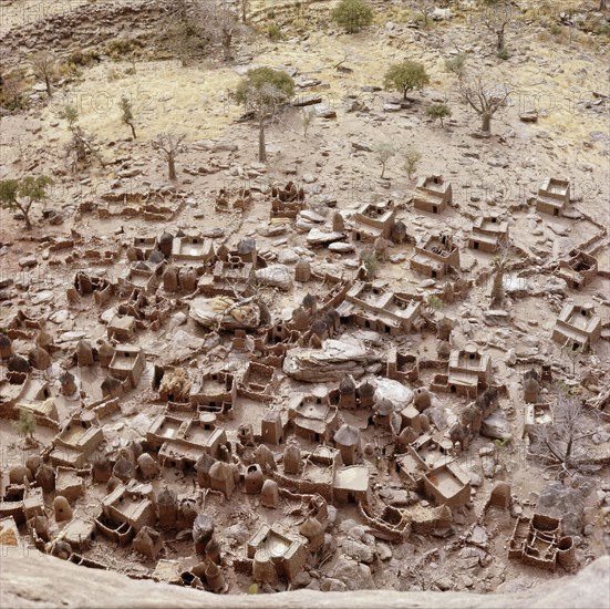 A Dogon village viewed from a cave in the Bandiagara cliffs
