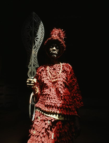 Sword ceremony of Chief Okonghae Ogiamwen, performed in the shrine in the palace courtyard